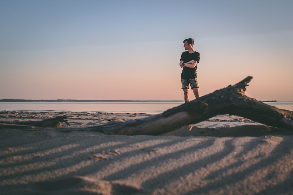 man standing near shore